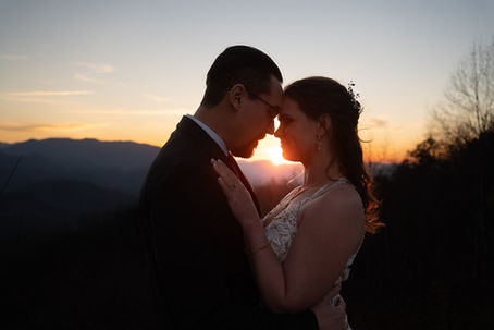 Newlyweds embracing at sunset after their Tennessee elopement