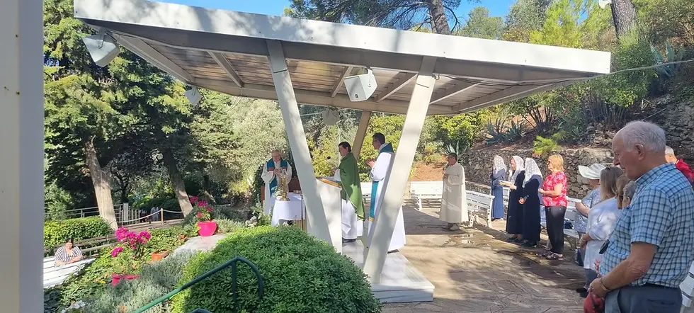 Mass outside Mary's House