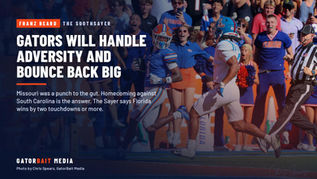 A Florida receiver in a blue No. 1 jersey crosses the goal line ahead of an Ole Miss defender as fans in the end zone stands celebrate at the Swamp, Sept. 26, 2026. Text reads The Soothsayer, Gators Will Handle Adversity and Bounce Back Big. Photo by Chris Spears, GatorBait Media.