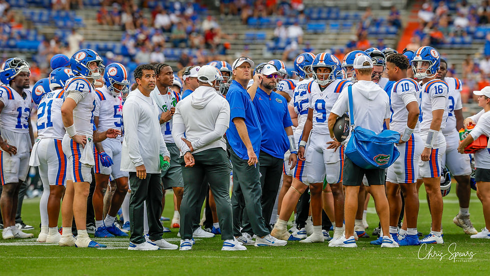 Aaron Philo, No. 12, at left, and Tramell Jones Jr., No. 9, at right, on Florida's sideline against South Carolina on Oct. 10, 2026.