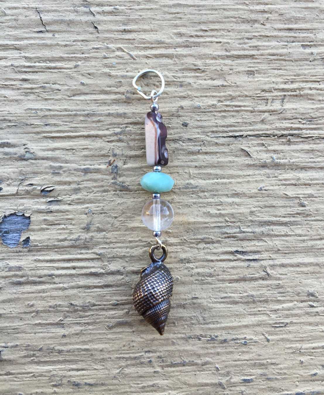 Conch shell charm
