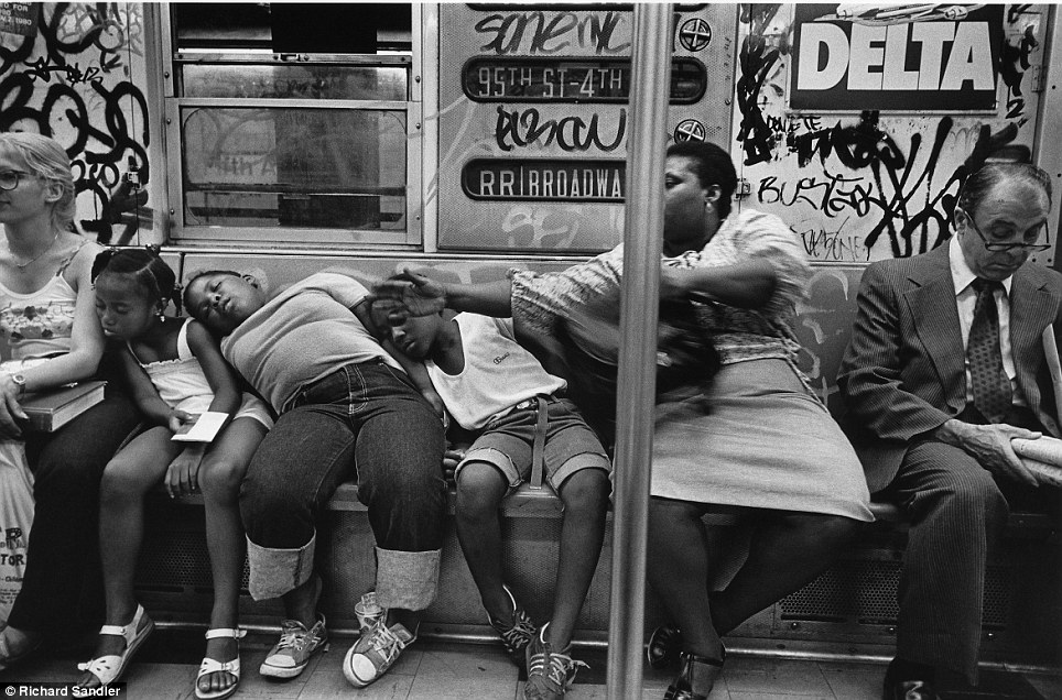 Domino effect- Three sleeping children slump against their carer as another woman who was not with t