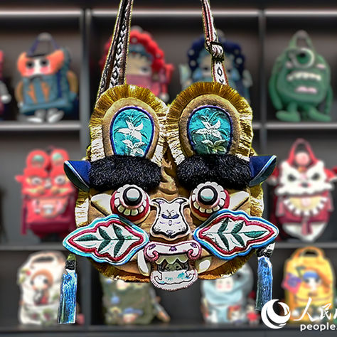 กระเป๋าลายหัวเสือแฮนด์เมดจากกว่างซีฮิตทั่วจีน ออเดอร์ยาวถึงกันยายน