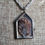 Miniature : A necklace like a Protection Talisman with a glass medallion showing a real piece of tree bark