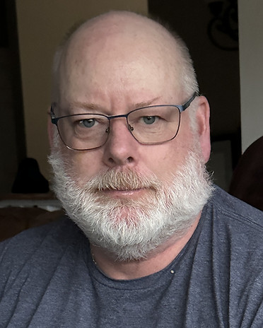 Headshot and biography of Tim Imhoff.