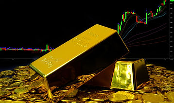 gold-bullion-on-pile-gold-coins-at-trading-chart-b-2022-11-02-16-22-25-utc.jpg