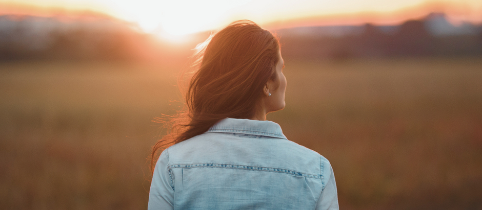 A woman looking at the sky