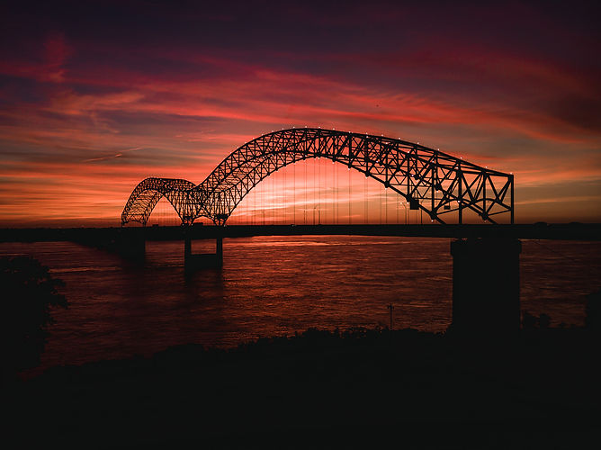 Hernando De Soto Bridge at sunset.jpg