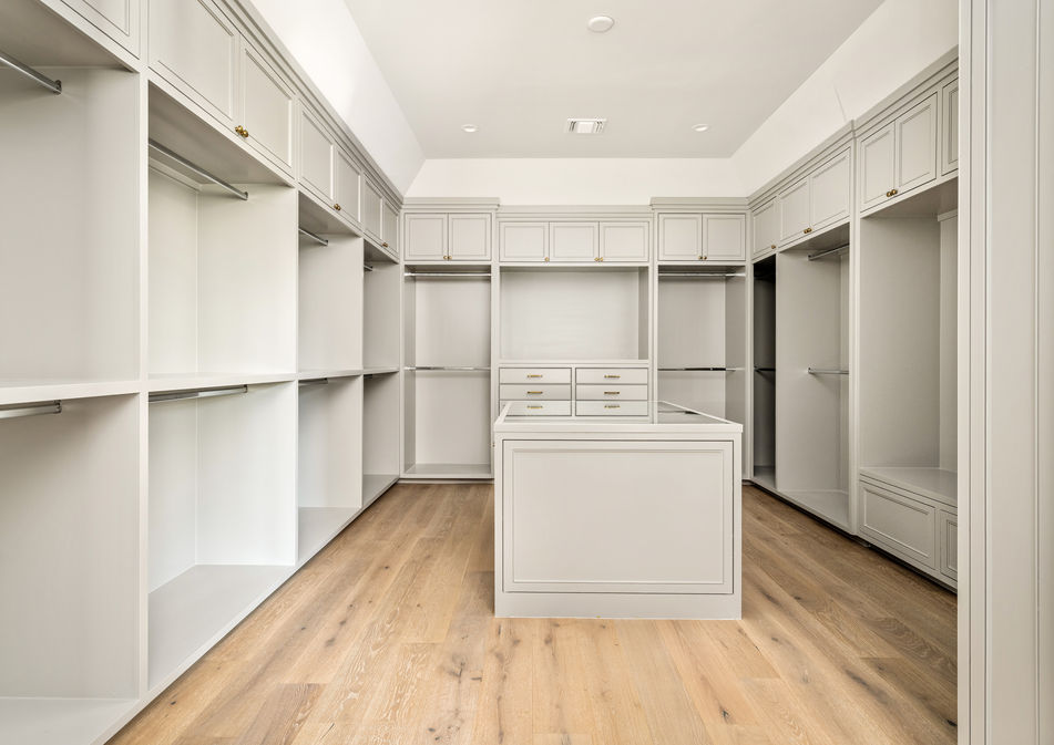 Second primary closet in Houston River Oaks area luxury home by Fifty Seventh & 7th Luxury Homes