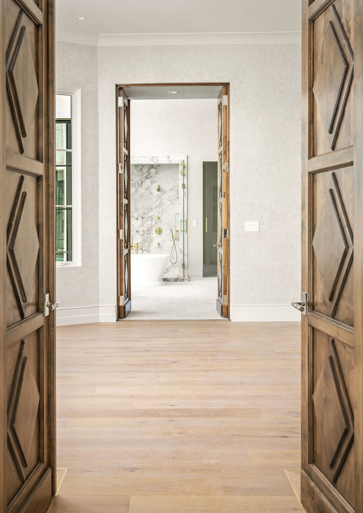 Stain doors in Houston River Oaks area luxury home by Fifty Seventh & 7th Luxury Homes