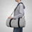 Thumbnail: model man carrying versatile grey duffel bag size small
