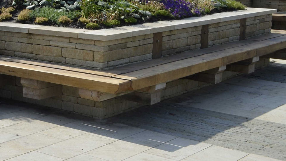 Tumbled coursed walling stone with uniform course heights and a clean, formal finish, laid in regular horizontal bands for a structured architectural appearance.