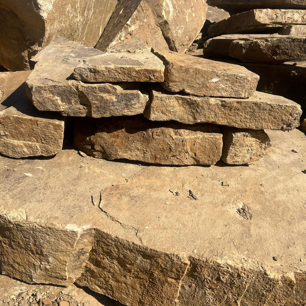 Traditional drystone wall built with buff-grey British sandstone