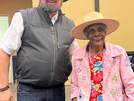 Man and woman smiling at camera
