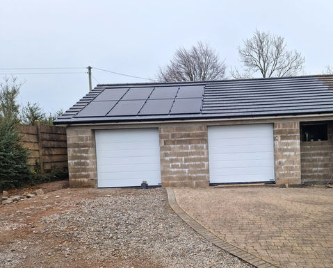 Twin garages with solar panels
