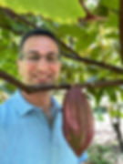 Me visiting a Cacao farm in Kauai, Hawaii. The picture is the Cacao pod before as in a full-grown state.