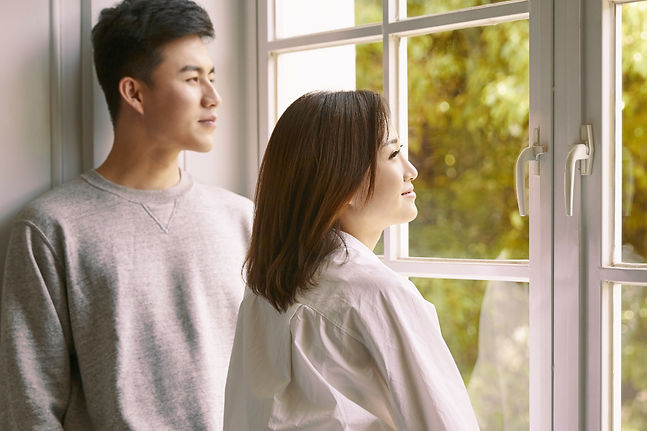 Couple Standing By Window_edited_edited.jpg