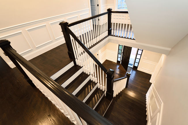 Interior staircase in new home. Colonial
