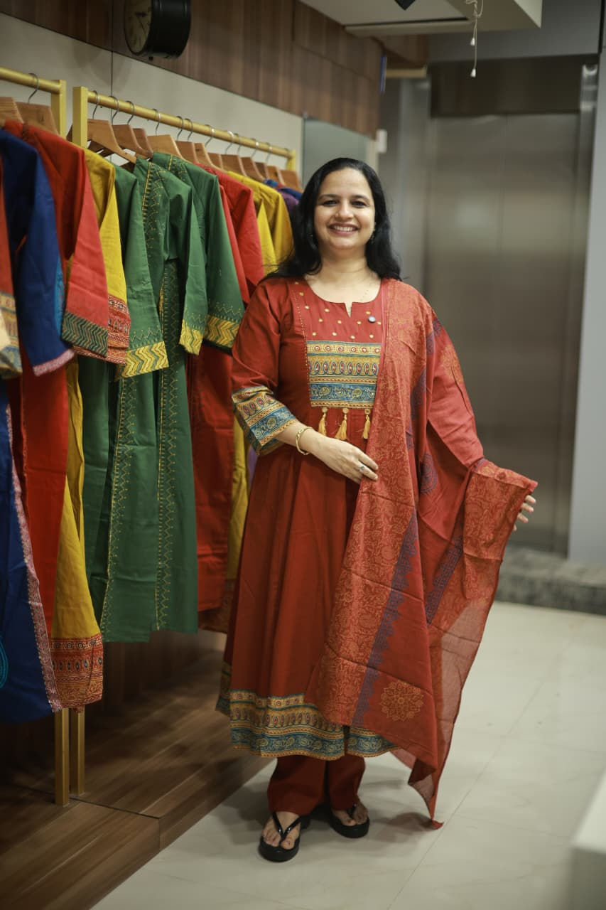 Brick Shade cotton stitched churidar set with printed dupatta for women
