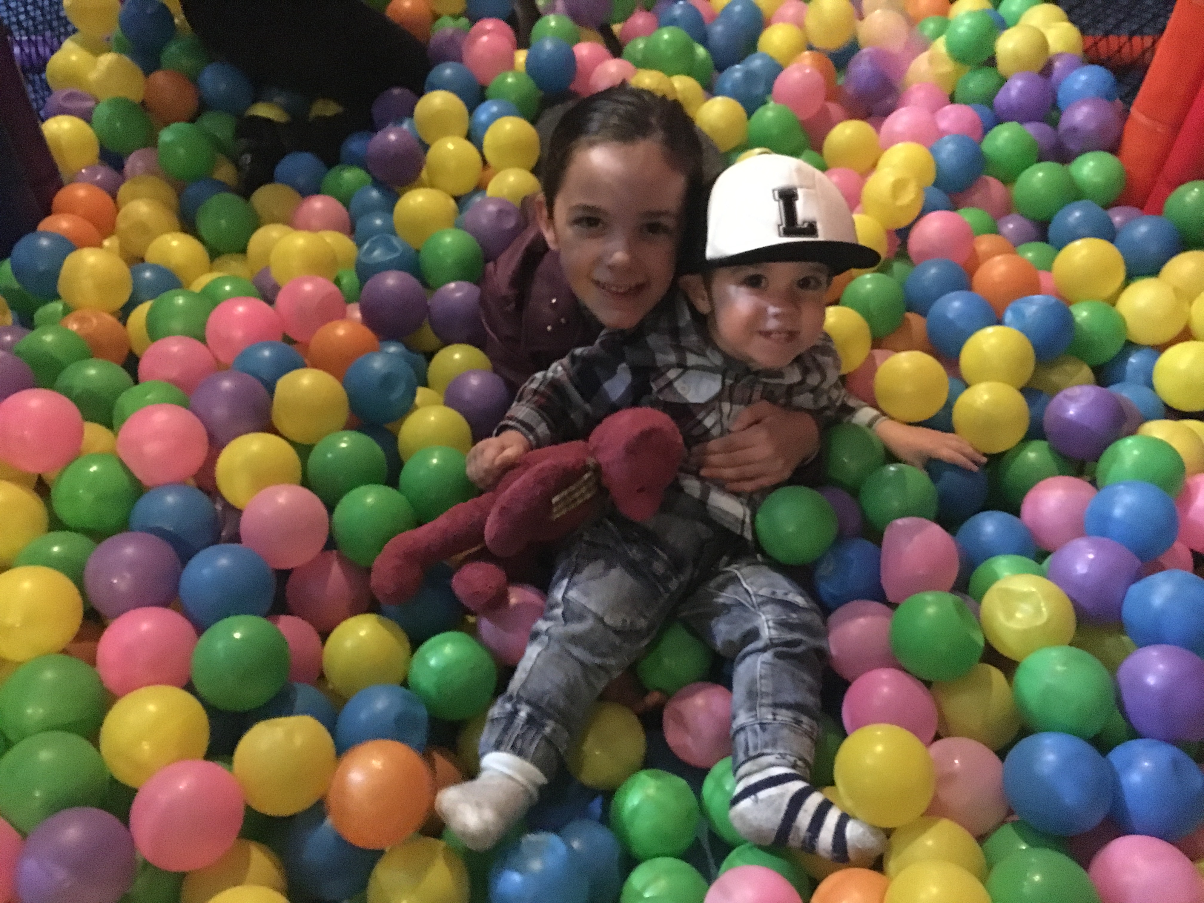Kids having fun in the ball pit