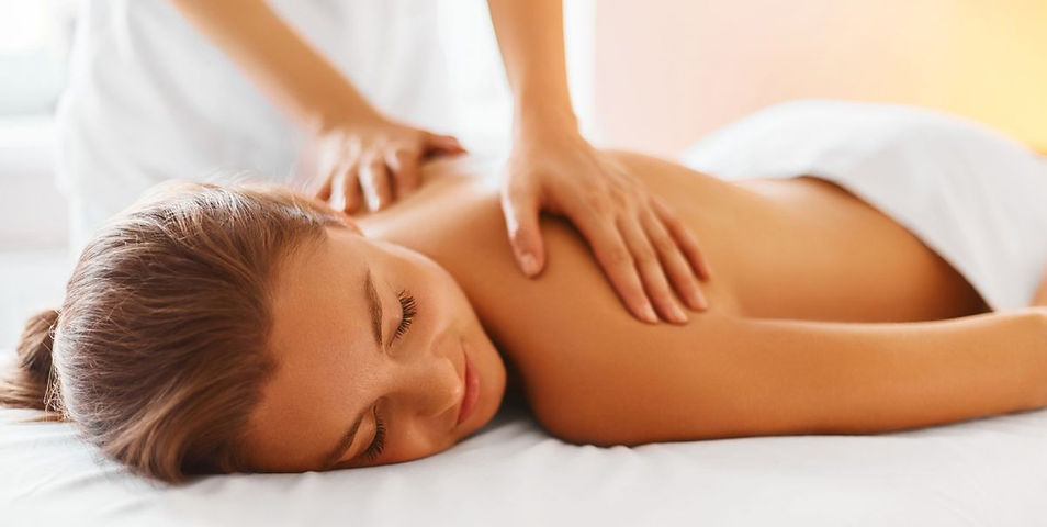 spa-woman-female-enjoying-massage-in-spa-centre-royalty-free-image-492676582-1549988720.jp