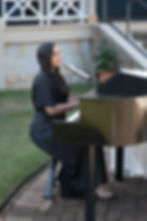Wedding singer and pianist performing live during a Brisbane wedding ceremony.
