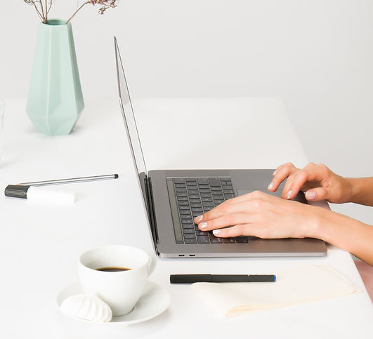 woman sitting while using laptop_edited_edited.jpg