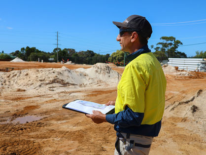 A Harley Dykstra surveyor in hi vis in Albany.