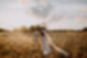A couple in Edith Valley fields by Light the Love Photography.