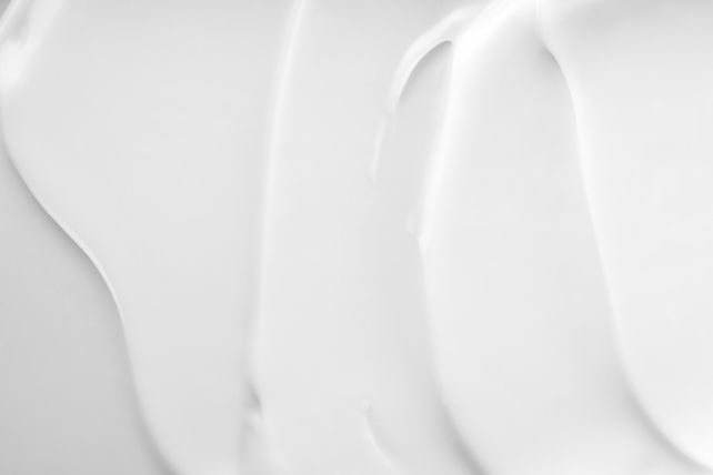 creamy-skincare-lotion-mousse-product-closeup-white-cream-shampoo-texture-sunscreen-cosmet