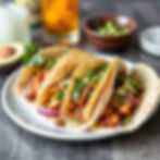 a delicious plate of 5 authentic mexican fajita street tacos.jpg