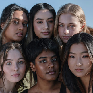 A diverse women of different ethnicities and skin tones.