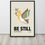 Thumbnail: Be Still Psalm 46:10 framed canvas Christian wall art minimalist dove and olive branch symbol peace Holy Spirit warm earthy t