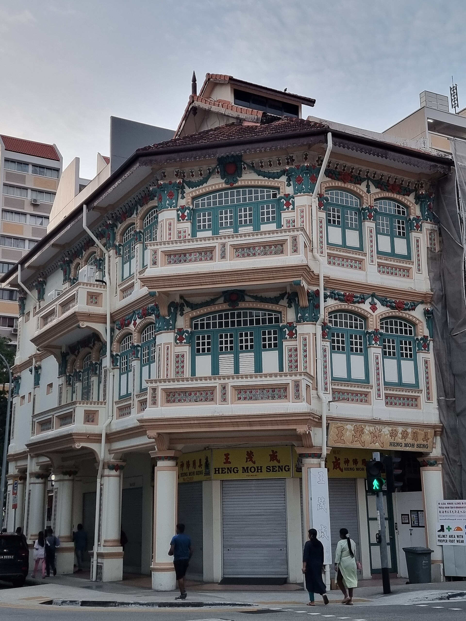 Ornate three-storey conserved shophouse with coloured tiles at 123 Jalan Besar, Singapore