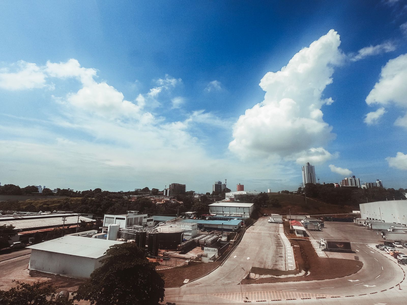 Aerial view of an industrial estate with low-rise factory and warehouse buildings