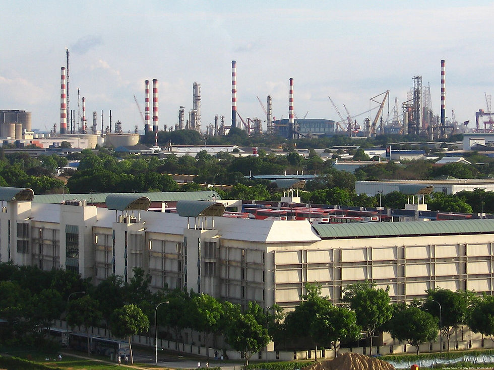 Aerial view of Jurong Industrial Estate in Singapore with refinery structures in the distance