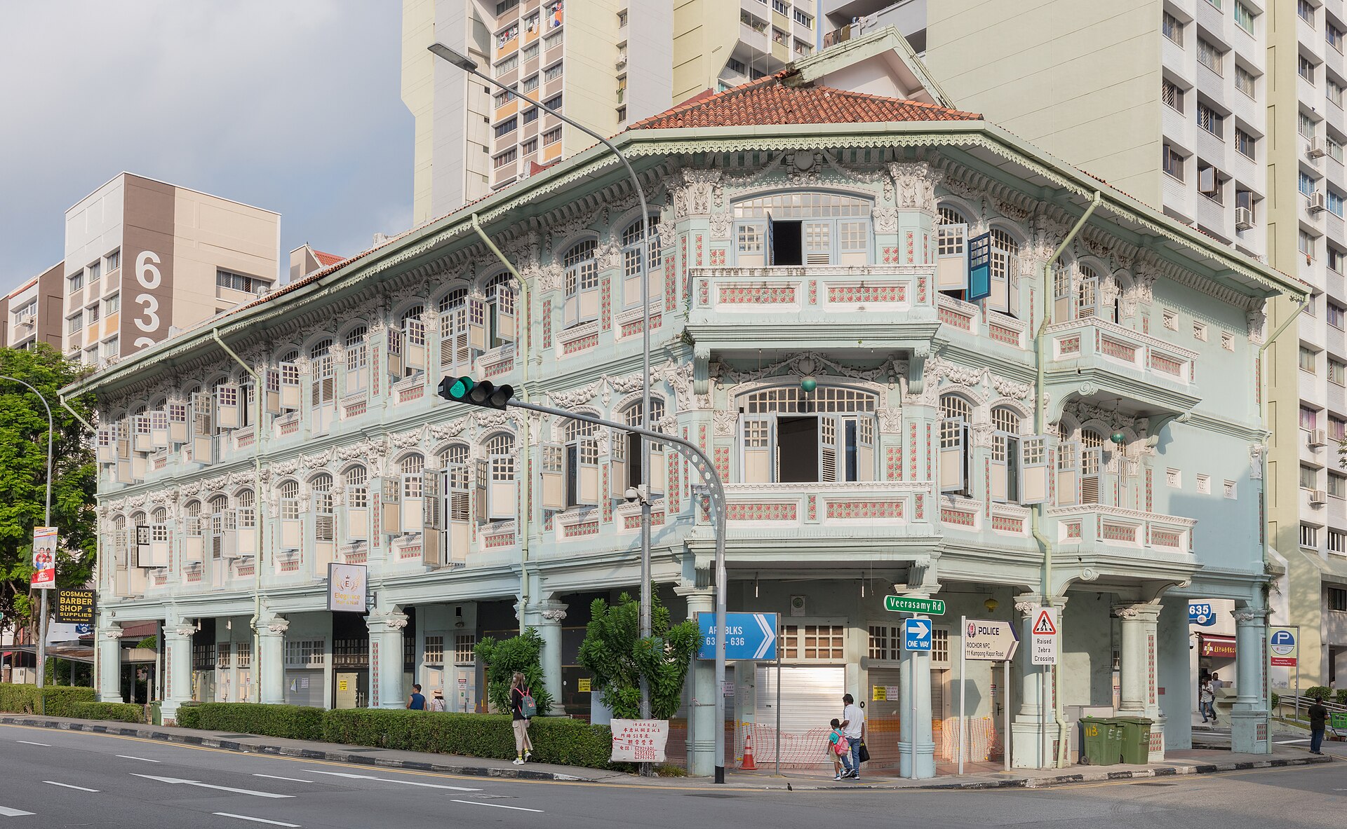 Restored two-storey shophouse building with white facade at 115 Jalan Besar, Singapore