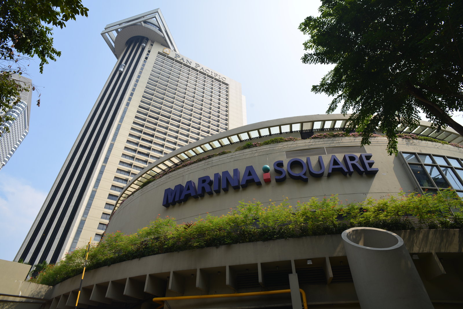 Marina Square shopping centre signage with the Pan Pacific Singapore hotel tower rising behind it