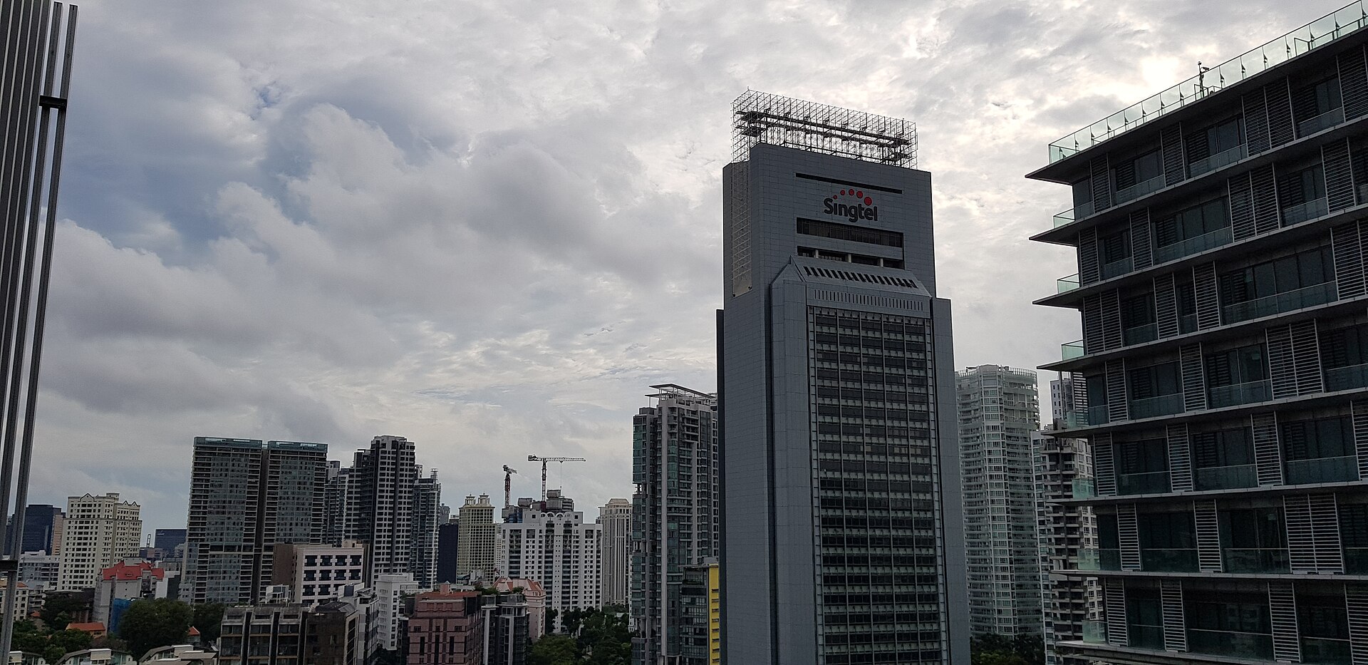 Singtel's original Comcentre tower near Somerset, photographed in 2021
