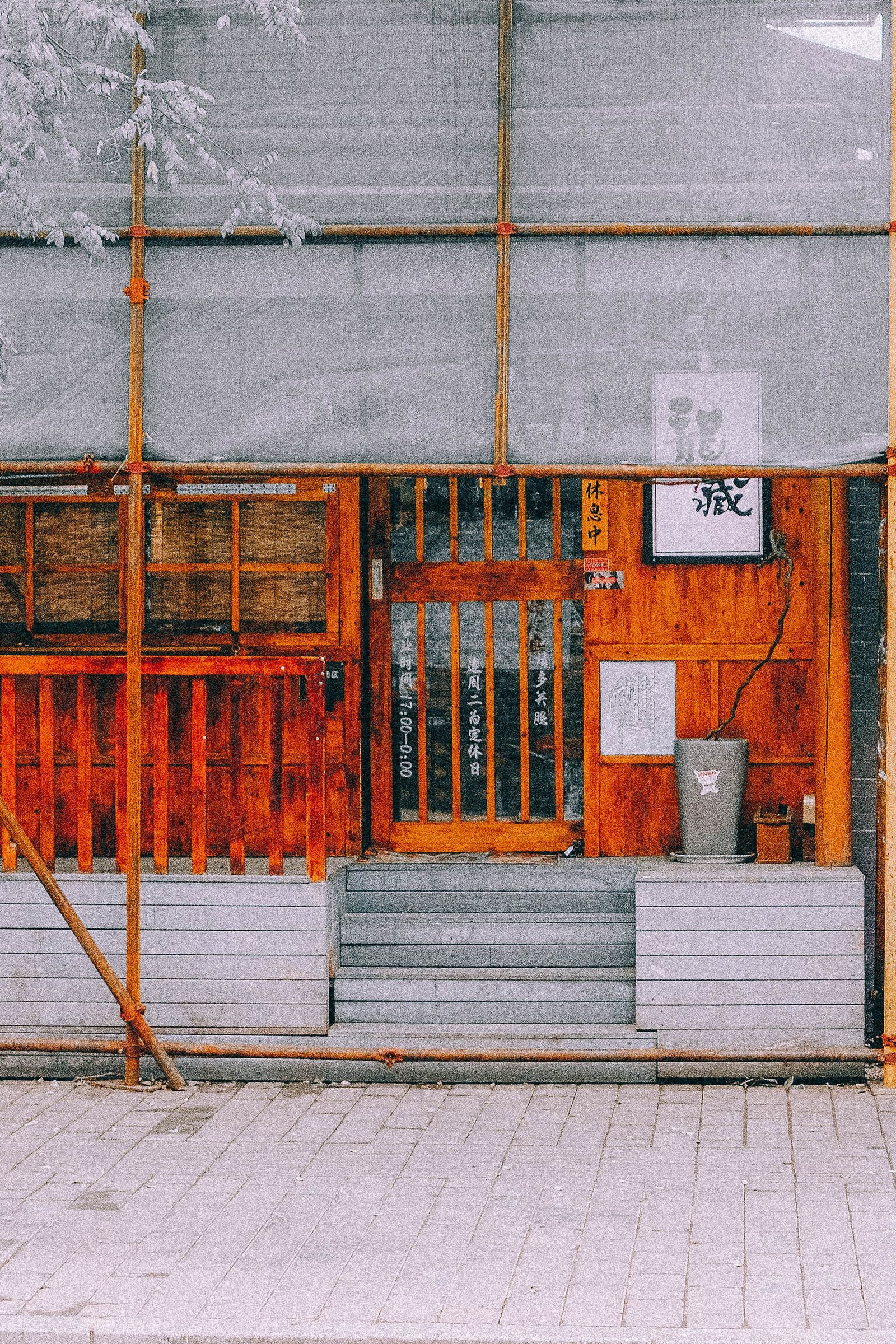 Restaurant shopfront behind scaffolding while renovation works are under way