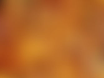 Golden, crispy roasted potatoes with a seasoned coating fill the frame. The potatoes have a delicious, textured appearance.