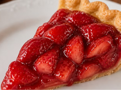 Slice of strawberry pie with glossy fresh strawberry filling arranged over a flaky golden crust.