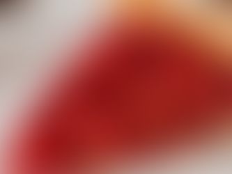 Slice of strawberry pie with glossy fresh strawberry filling arranged over a flaky golden crust.