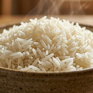 steamy & Fluffy White Rice in a ceramic bowl