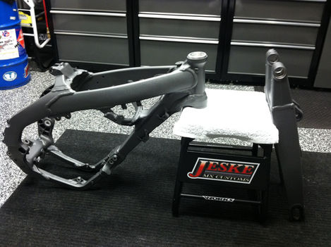 Frame and swing arm after the coatings were done for TWMX project bike.