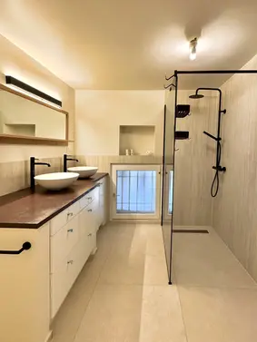 Sophisticated bathroom with sleek modern design, quality fixtures and spa-inspired comfort in a luxury countryside villa in Provence.