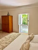 Comfortable bedroom with premium mattress, modern climate control and charming Provençal design in L'Isle-sur-la-Sorgue.
