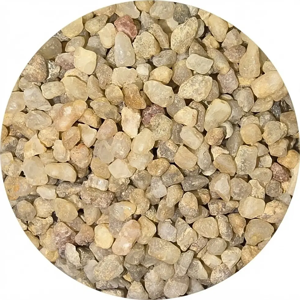 Close-up photography of a pile of small, natural gravel stones. The stones display various earthy tones and a rough texture.