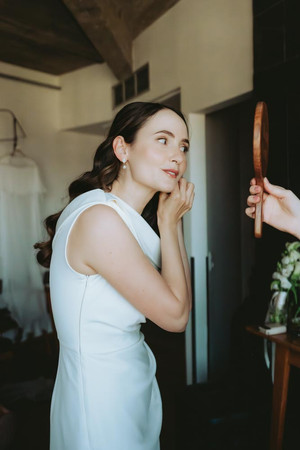 Bride and groom getting ready at Hotel Manon Les Suites in Copenhagen before their wedding ceremony