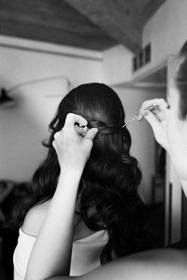 Bride and groom getting ready at Hotel Manon Les Suites in Copenhagen before their wedding ceremony